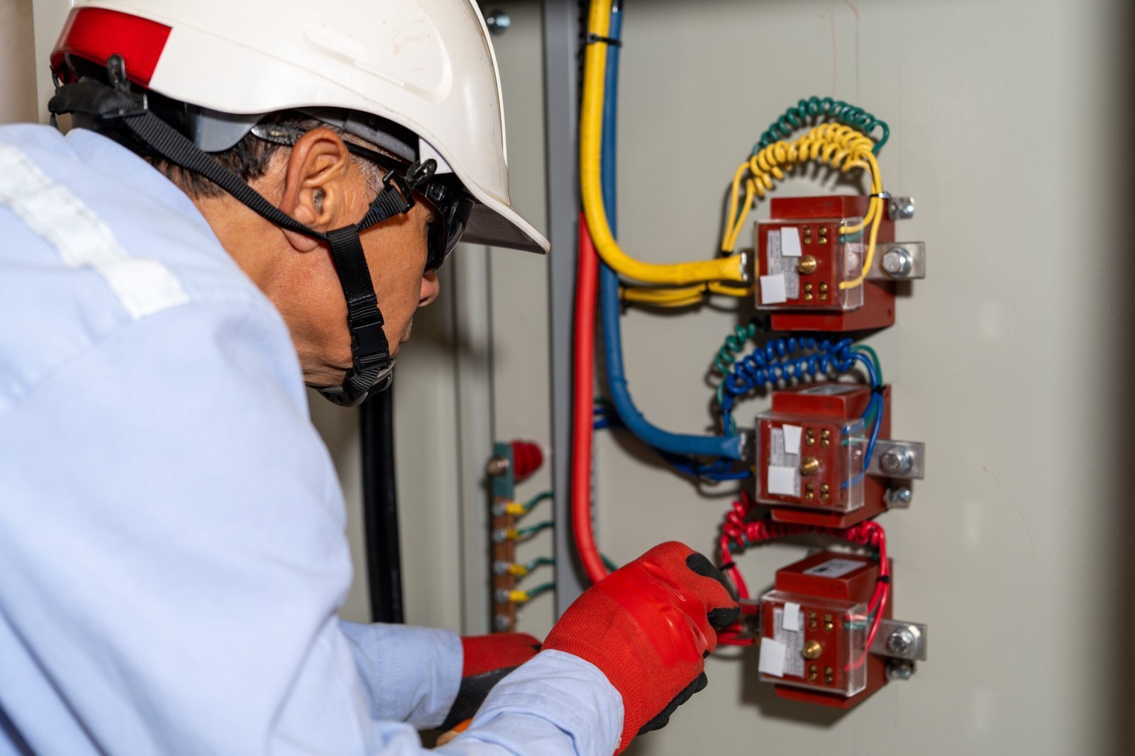 latin-electrical-engineer-performs-maintenance-on-2025-04-22-18-32-58-utc-scaled-1.jpg